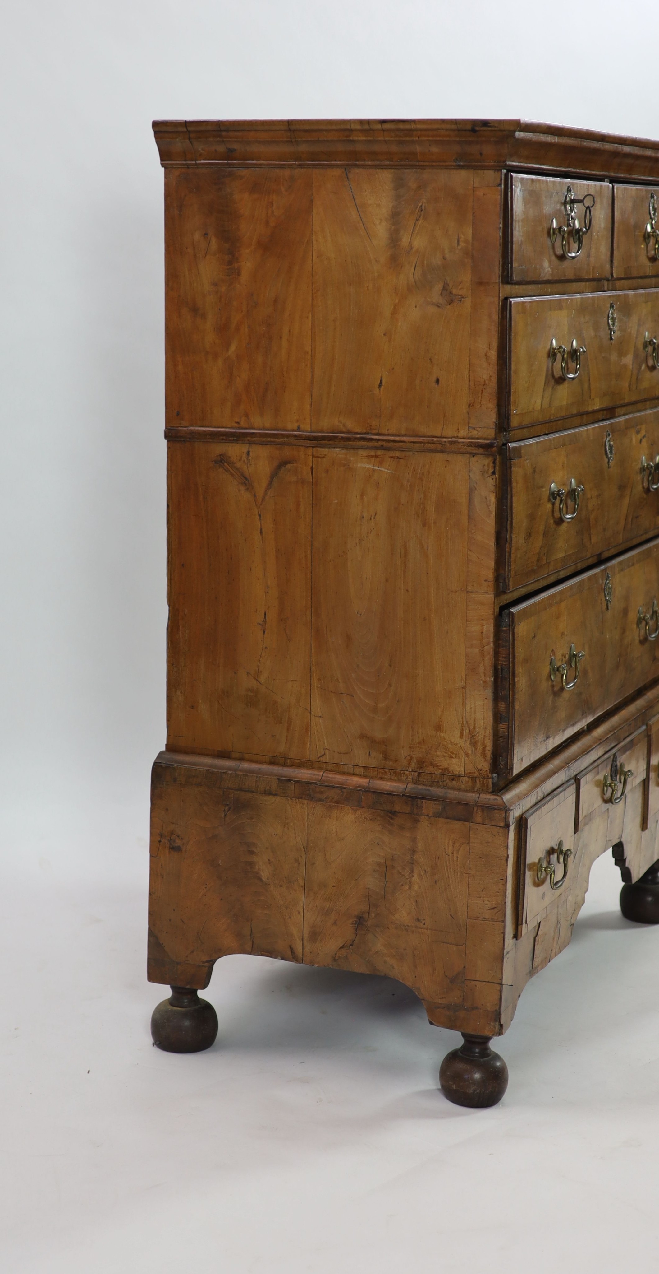 A George II walnut chest on stand W.102cm D.51cm H.132cm